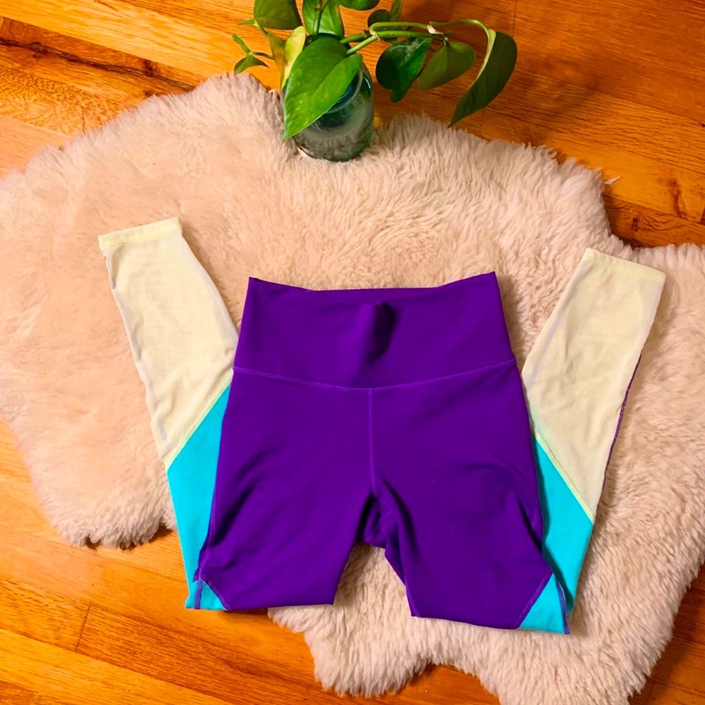 Purple, blue and yellow powerhold leggings from fabletics!